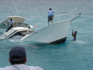 Boating-Accident-Lawyer-Charlotte-NC-sinking-boat-in-the-ocean