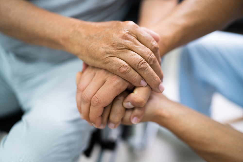 Top Power Of Attorney Questions - Elder Patient Helping Nurse Hand